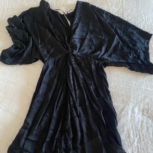 Slinky, flowery sleeved mini dress